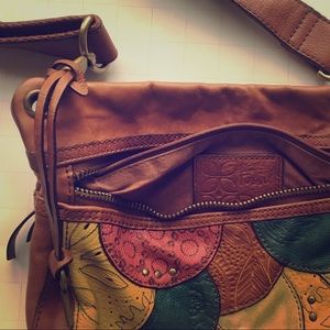 Fossil leather embossed crossbody bag